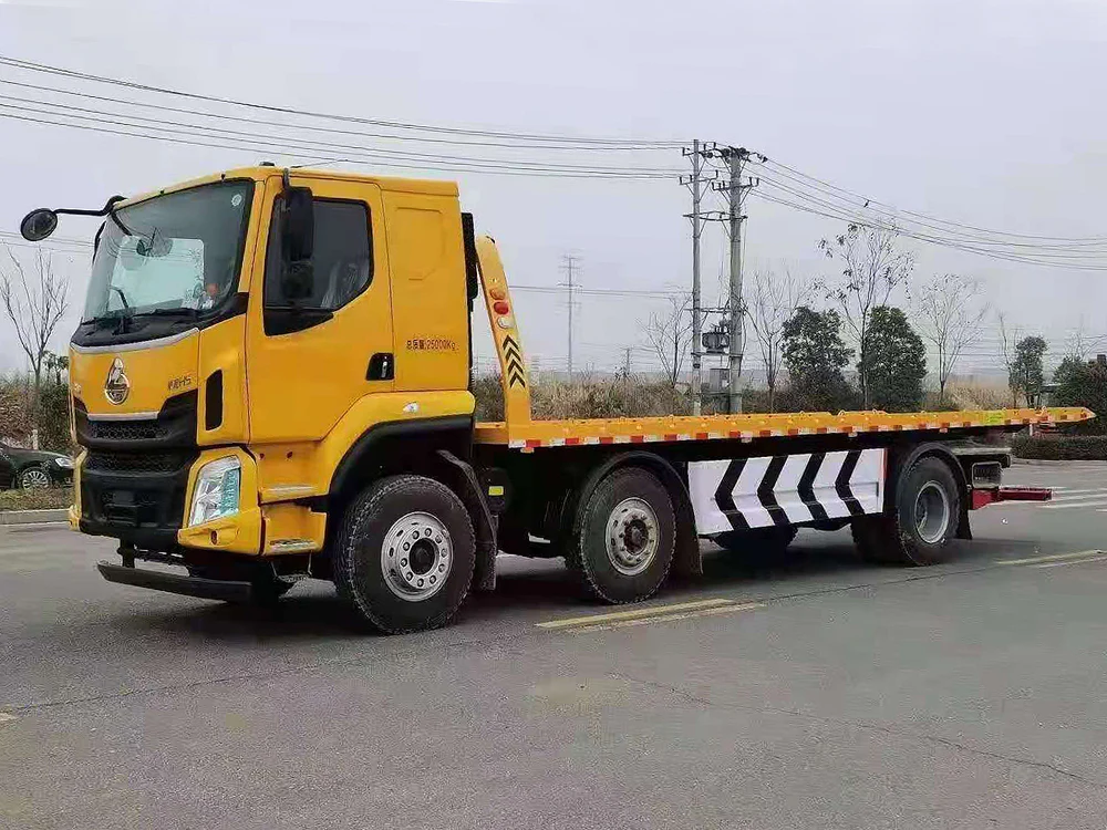 Эвакуатор SINOTRUK HOWO 8×4 с интегрированным краном-манипулятором
