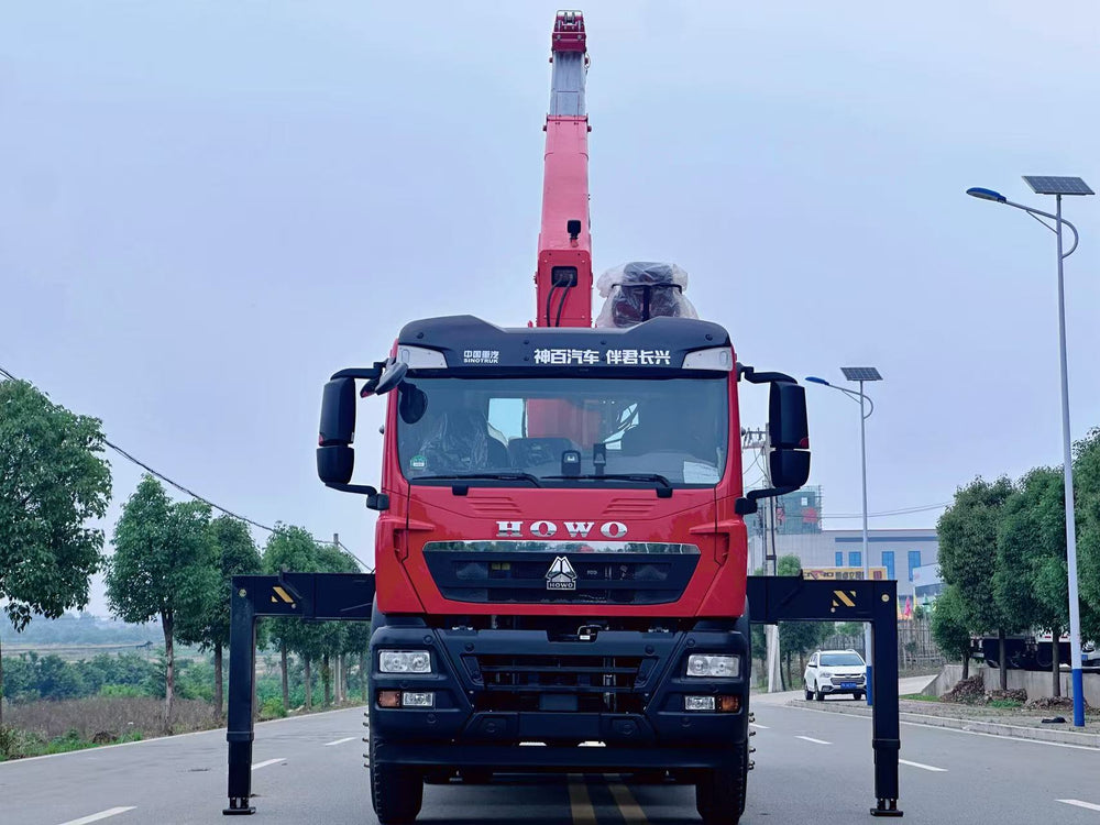 Продается кран-манипулятор HOWO TX Palfinger14T с телескопической стрелой